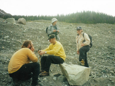 Putting on the crampons prior to getting on the glacier