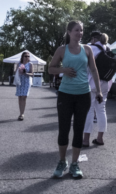 Woman at the market without earphones 1