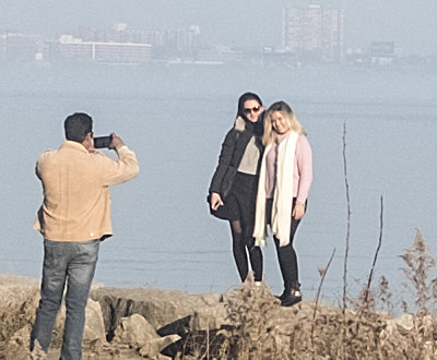 Couple having their picture taken at Lake Ontario