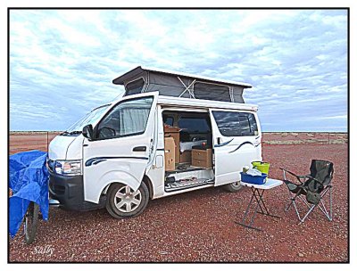 Camping alone, off unpaved roads, 
with no-one around for hundreds of miles 
in Australia's treeless Red Center
so-called for the red color of the desert sand.