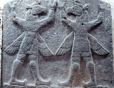 Two winged and bird headed men