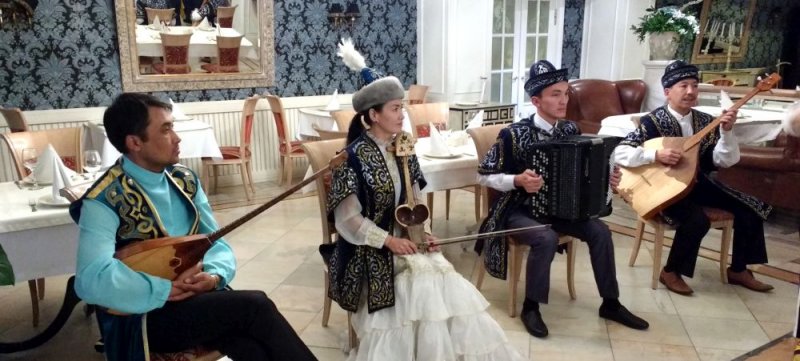 Members of the Kazakhstan national orchestra <a href=https://youtu.be/8qUbRnM7Nrc>performing</a> for us at dinner in Almaty