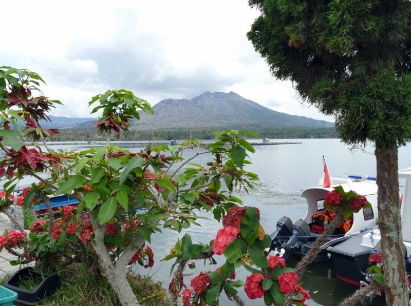 Mountain and Lake Batur where we took a motor boat to a small village and a unique cemetary