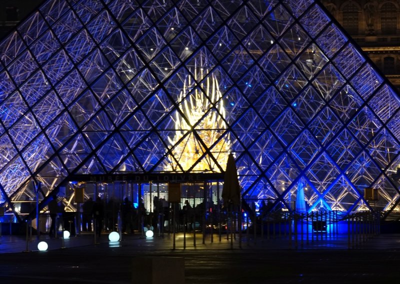 The sculpture within the Pyramid designed by I. M. Pei, is called Throne and was done by the artist Hohei Nawa