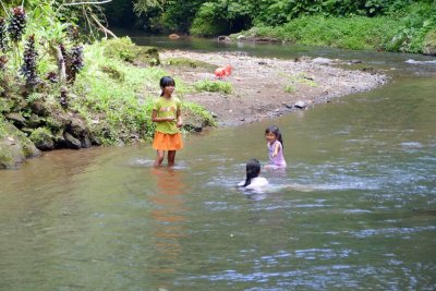 Children at play in the river
