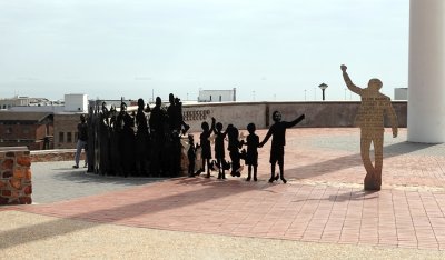 Sculpture represents Nelson Mandela and the thousands of South Africans who voted in the 1st democratic elections in 1994