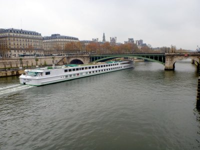 A riverboat cruising the Seine