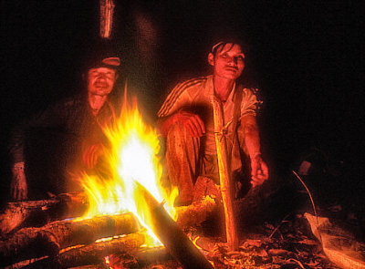 Mahuts Tending Campfire