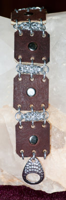 bracelets --  squares  brn w rivet.jpg