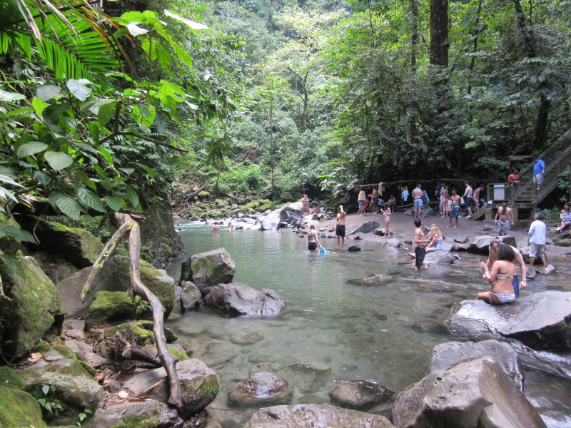 Enjoying a cool dip at the bottom of the falls