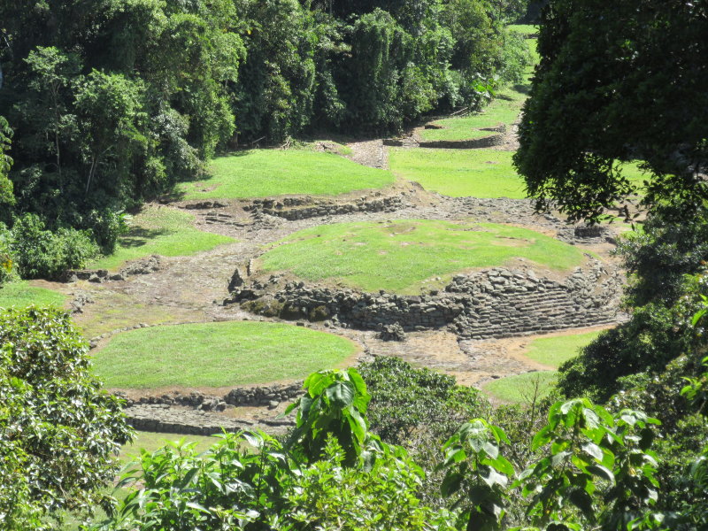 Circular stone bases remain - they would have had conical roofs