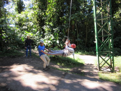 Guide stopping Jackie on the Tarzan swing