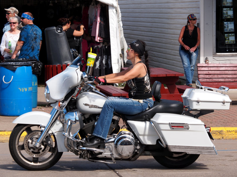 A Pretty Lady And Her Harley...