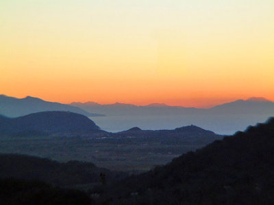 Sunset ... reveals Corsica's profile again   -   Nov 2004