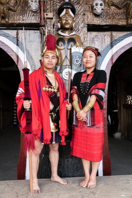 A Couple from the Phom Tribe in Front of the Phom Morung