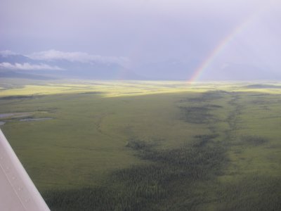 Returning under a rainbow across the tundra