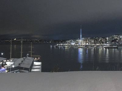 Oslo harbor, with a ski run in the distance
