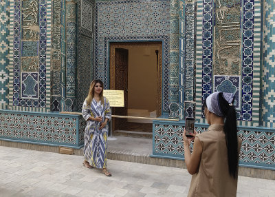 Posing with art at Shah-i-Zinda, Samarkand
