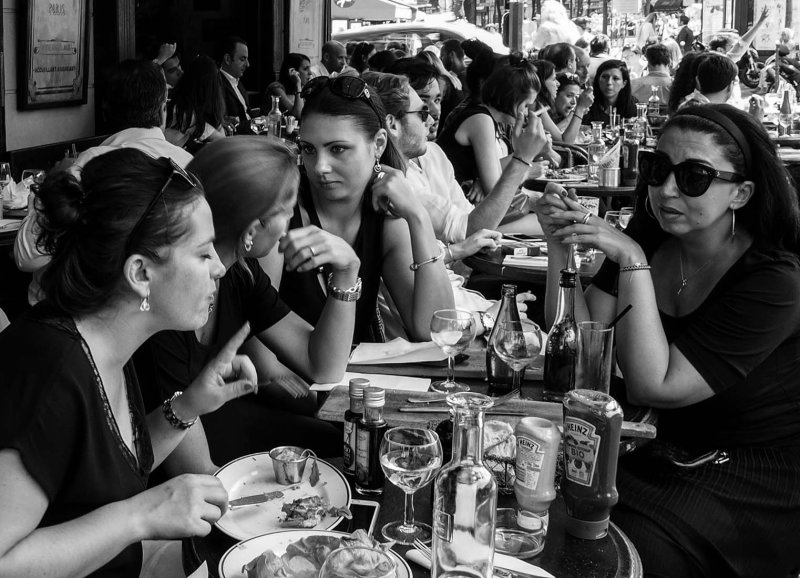 Vivid conversation inside the café. 