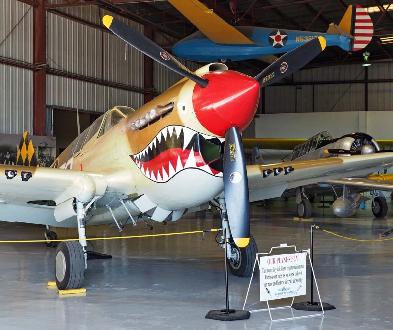 A WW II American fighter (probably the Curtiss P-40).