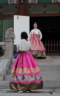 Inside the Gyeongbokgung Palace; Korean girls with typical clothes.