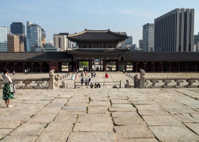 Inside the Gyeongbokgung Palace; Seoul downtown in the background.