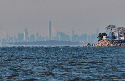 NYC, pictured from the Stamford area; very far; this 'impressionist' photo is actually a detail from a much larger one.