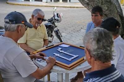 Fishers and retired guys playing domino, very common in several places of the Santa Catarina state coast. 