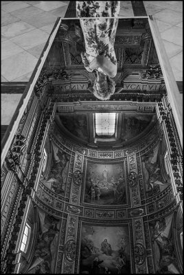 Mirror to see the ceiling of  the church, common in Rome...