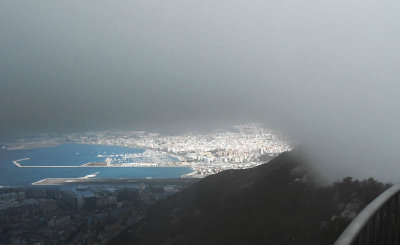 Levanter blowing clouds upwards_from top of the rock