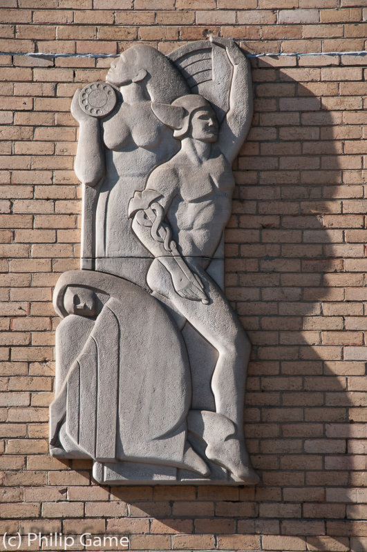 1950s bas-relief on the wall of a former post office & telephone exchange