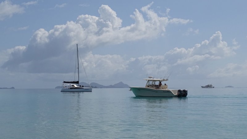 Boats off Whitehaven Beach
