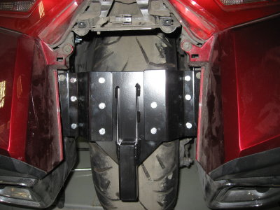 Receiver bracket mounts behind rear fender