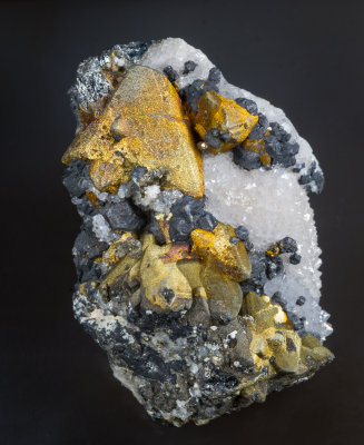 Tetrahedrite crystals, chalcopyrite-coated to 2 cm on 5 cm matrix. Herodsfoot Mine, Lanreath, Cornwall.