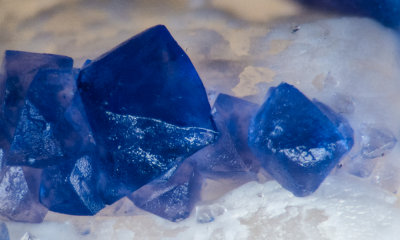Huanggang trisoctahedral fluorite crystals on quartz