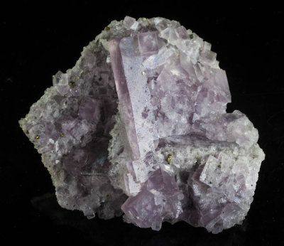 elongate lilac fluorite, 56 mm long, 10 mm wide, from Blackdene Mine, Weardale, Durham.
