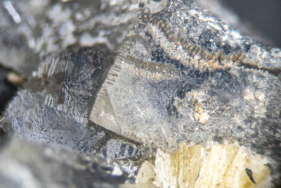 Phosgenite, transparent tabular crystal with etched edges