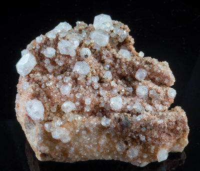 Analcime crystals to 1 cm on calcite druse, 7 cm matrix, Croft Quarry, Croft, Blaby, Leicestershire