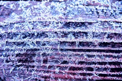 A hint of frost on wood