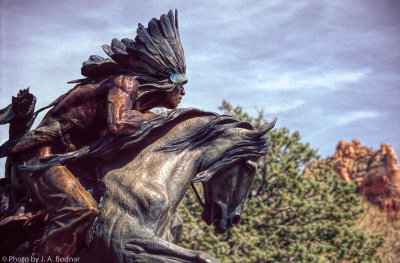 Image of American Indian galloping somewhere in Arizona