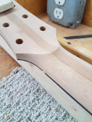 Headstock to valute to neck