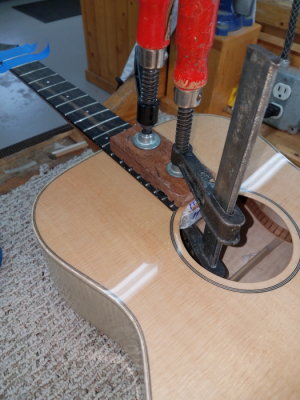 Fretboard glued to top after lacquer was removed