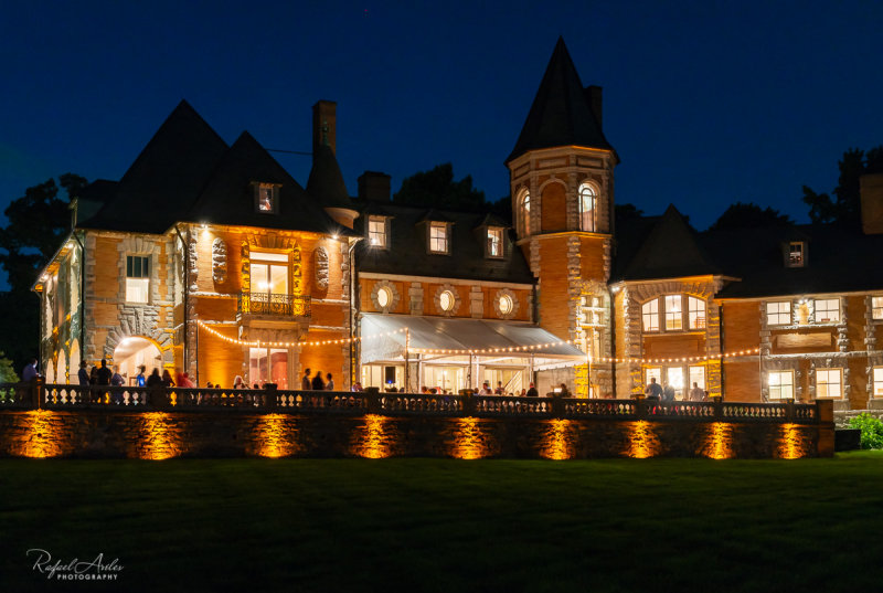 The mansion across the yard.