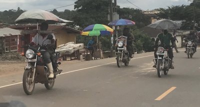 Motoerbikes with umbrellas