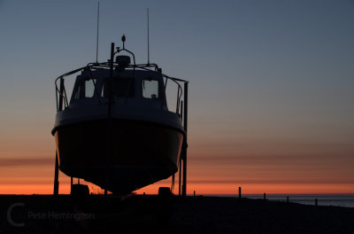 Silhouetted boat