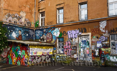 Graffiti on wall at Metelkova City Autonomous Cultural Center squat at former Yugoslav National Army military barracks in Ljublj