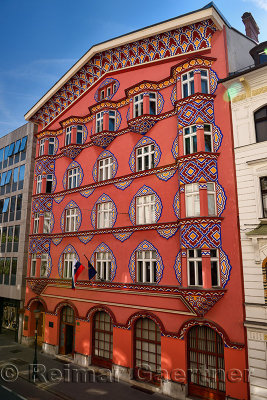 Pink facade of the Cooperative Business Bank Building called Vurnik House designed by Ivan Vurnik and painted by wife Helena Lju