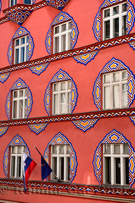 Brightly colored facade Vurnik House or Cooperative Business Bank Building by Ivan Vurnik 1921 painted by wife Helena in Ljublja