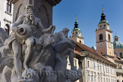 Detail of the Robba marble scultpure on The Fountain of the Three Rivers at Town Square Ljubljana Slovenia with St Nicholas chur