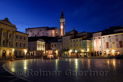 Tartini Square Plaza in Piran Slovenia with City Hall, Tartini statue, St. Georges Parish Church with belfry tower, Venetian Ho